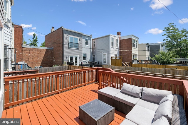 106 15th St SE, Washington, DC 20003 - deck featuring outdoor lounge area, a fenced backyard, and a residential view