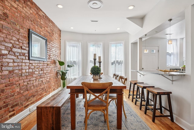 106 15th St SE, Washington, DC 20003 - dining room with brick wall, light wood-style floors, and recessed lighting