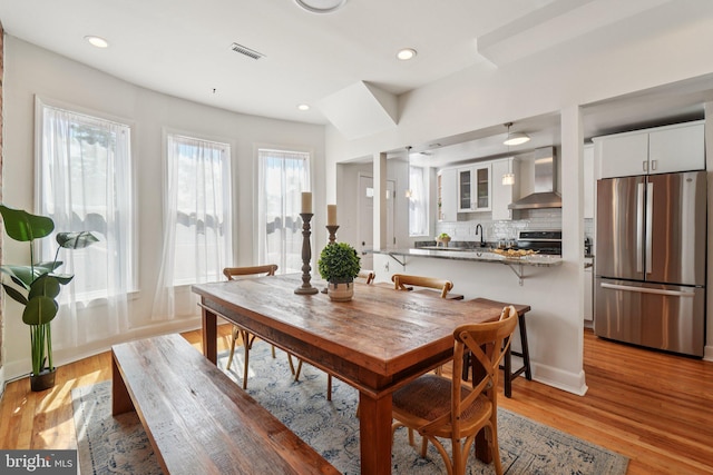 106 15th St SE, Washington, DC 20003 - dining space with light wood finished floors and recessed lighting