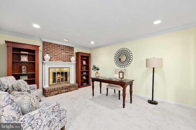 carpeted home office with recessed lighting, a brick fireplace, baseboards, and ornamental molding