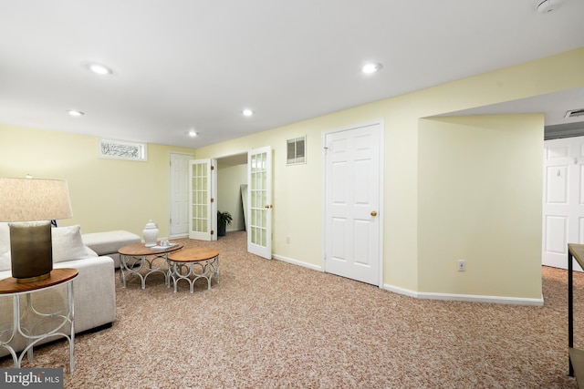 living area featuring visible vents, recessed lighting, french doors, carpet floors, and baseboards