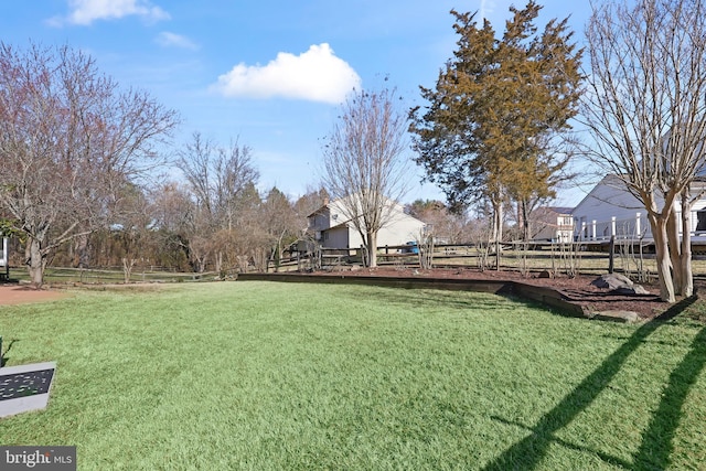 view of yard featuring fence