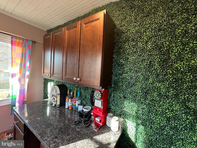 kitchen featuring tasteful backsplash and wooden ceiling