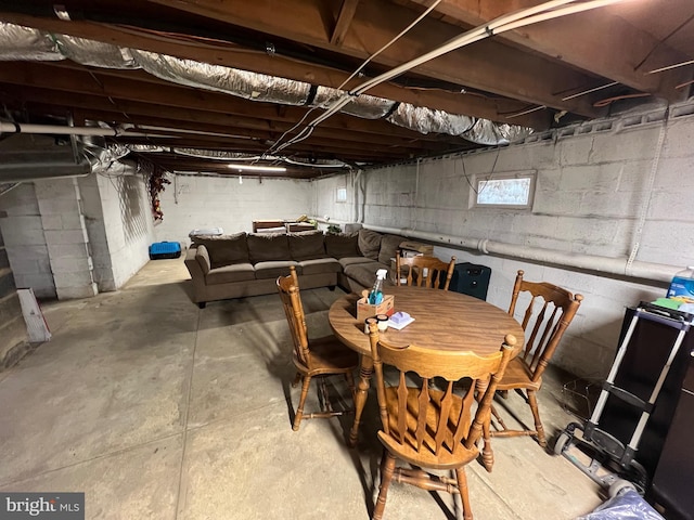 dining room with concrete flooring