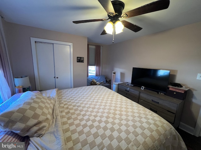 bedroom featuring a closet and ceiling fan