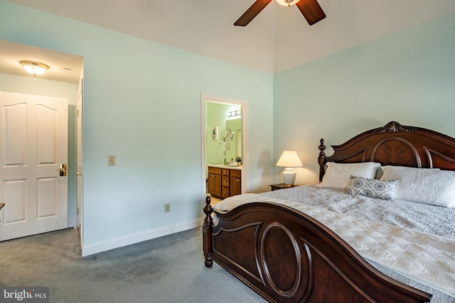 bedroom with baseboards, carpet, and ensuite bathroom