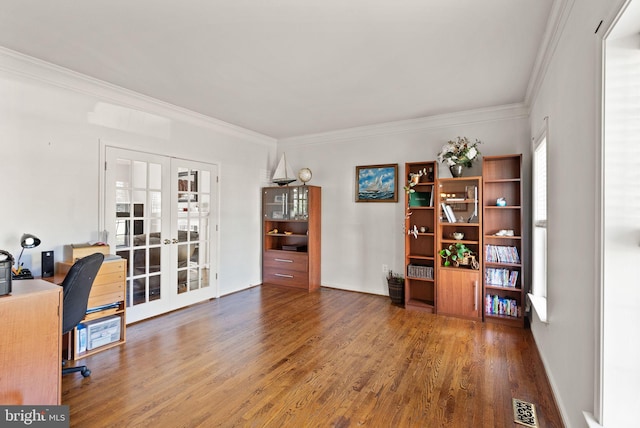 office with wood finished floors, crown molding, french doors, and visible vents