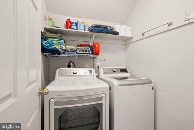 laundry area featuring washer and dryer and laundry area