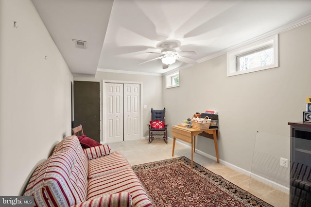 living area with baseboards, carpet floors, and ornamental molding