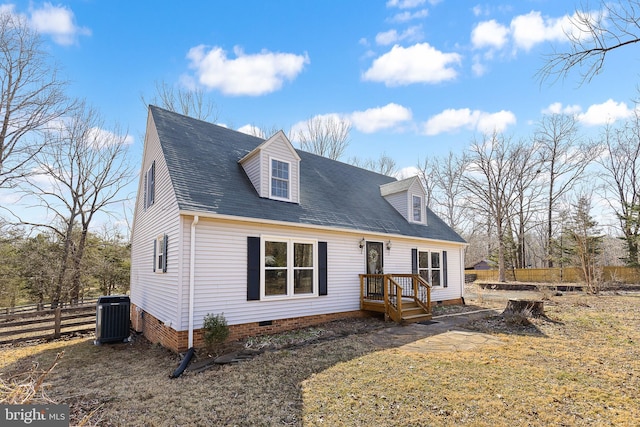 view of front facade with a shingled roof, cooling unit, fence, and crawl space