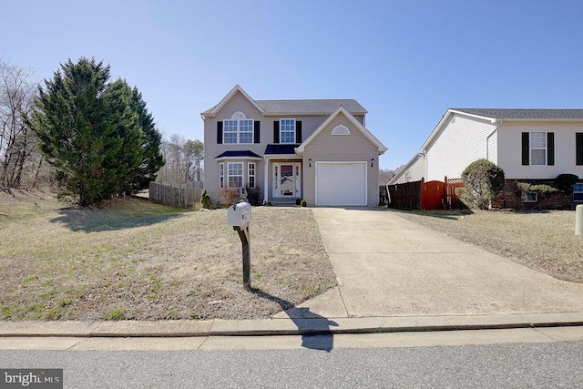 traditional home with concrete driveway, fence, and a garage