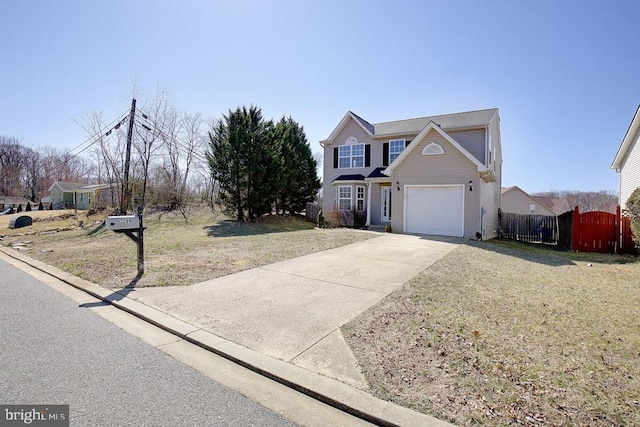 traditional-style home with a garage, concrete driveway, a front lawn, and fence