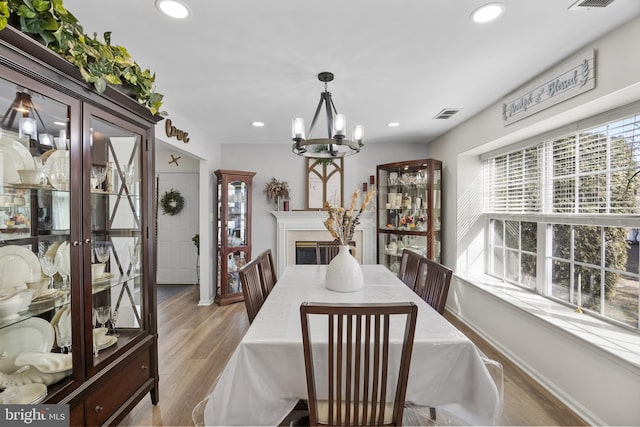 dining area featuring plenty of natural light, recessed lighting, and light wood finished floors