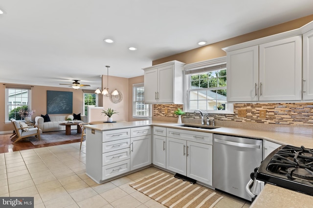10 Silver Maple Dr, Boiling Springs, PA 17007 - kitchen with stainless steel appliances, open floor plan, light countertops, a peninsula, and a sink