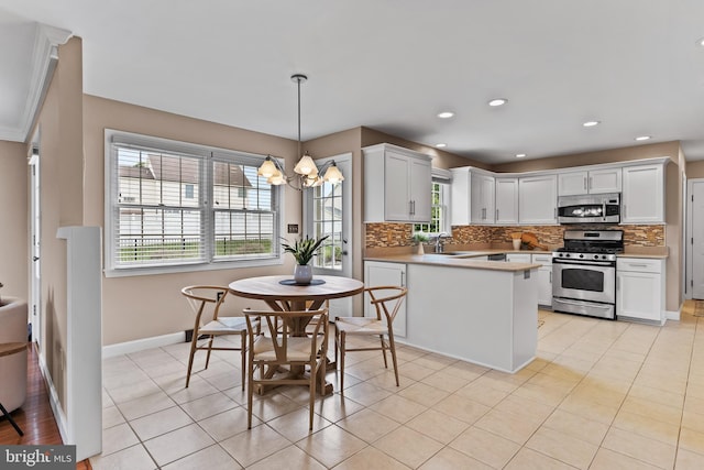 10 Silver Maple Dr, Boiling Springs, PA 17007 - kitchen with appliances with stainless steel finishes, a chandelier, backsplash, a sink, and recessed lighting