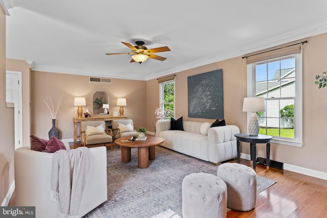 10 Silver Maple Dr, Boiling Springs, PA 17007 - living room featuring wood finished floors, baseboards, a ceiling fan, and crown molding