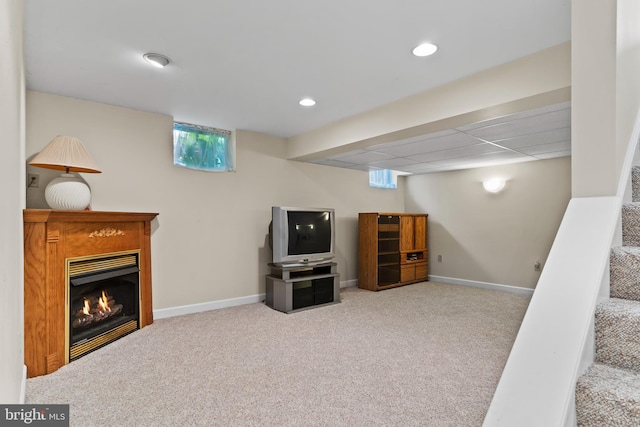 10 Silver Maple Dr, Boiling Springs, PA 17007 - basement with carpet floors, baseboards, healthy amount of natural light, a glass covered fireplace, and recessed lighting