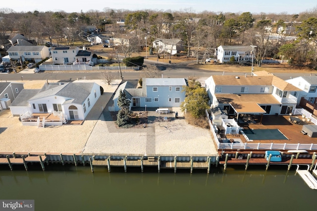 aerial view featuring a residential view and a water view