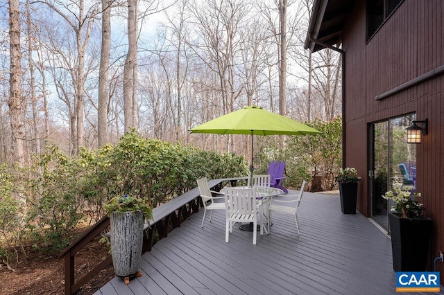 deck featuring outdoor dining space