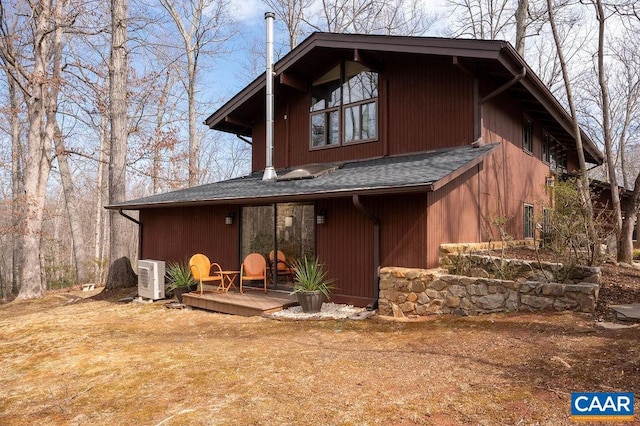 view of front of house with a shingled roof