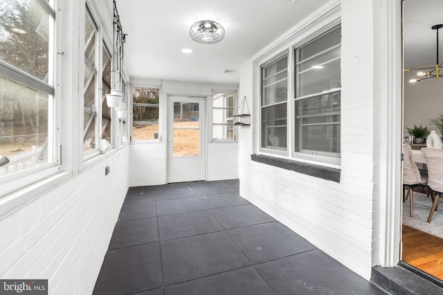 view of unfurnished sunroom