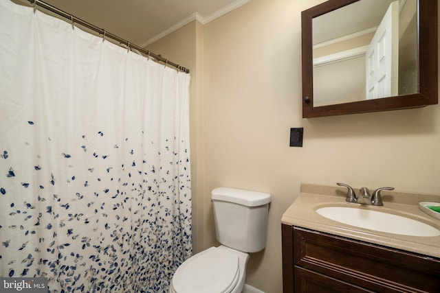 bathroom featuring curtained shower, vanity, crown molding, and toilet