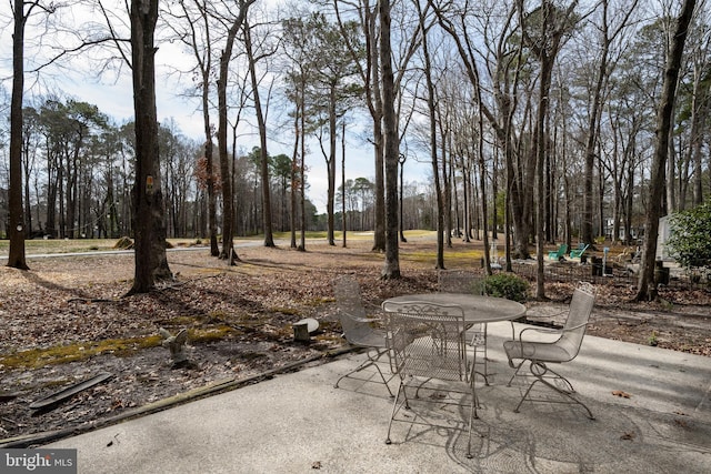 view of patio featuring outdoor dining area