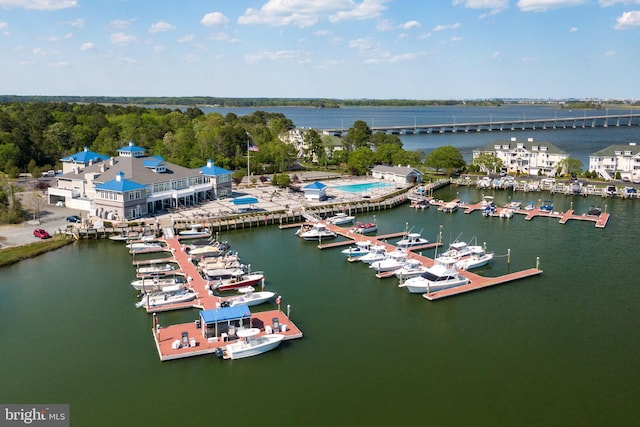 birds eye view of property with a water view