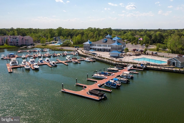 birds eye view of property with a water view