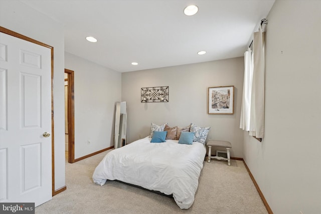 bedroom with recessed lighting, baseboards, and carpet flooring