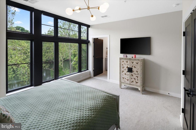 bedroom with a notable chandelier, carpet, visible vents, and baseboards