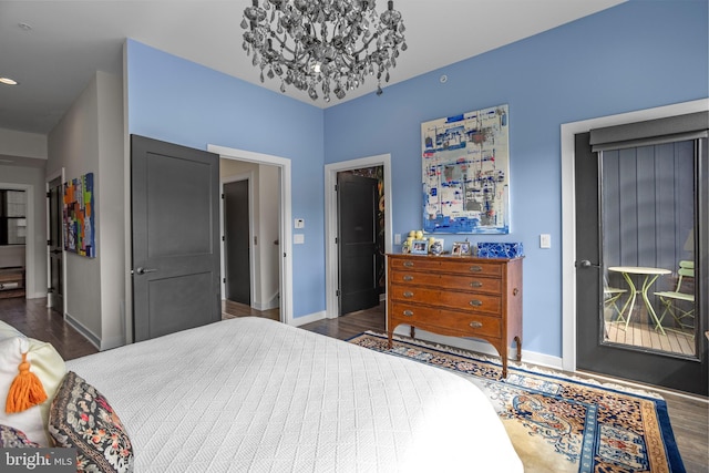 bedroom featuring baseboards and wood finished floors