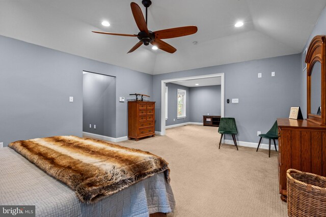 bedroom with light carpet, a ceiling fan, recessed lighting, baseboards, and vaulted ceiling