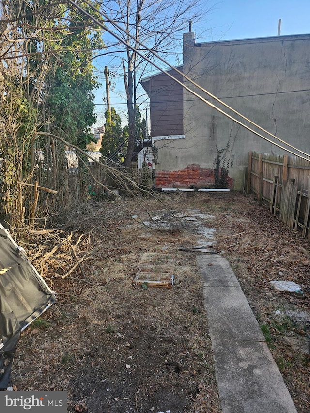 view of yard featuring fence