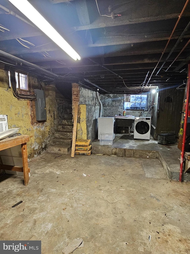 basement with washer / dryer and electric panel