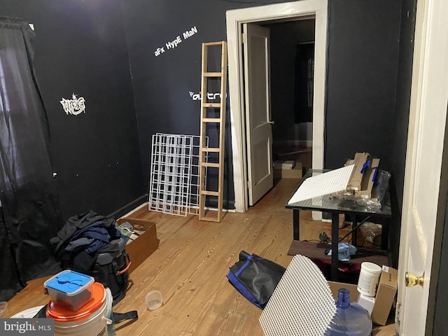 bedroom featuring wood finished floors