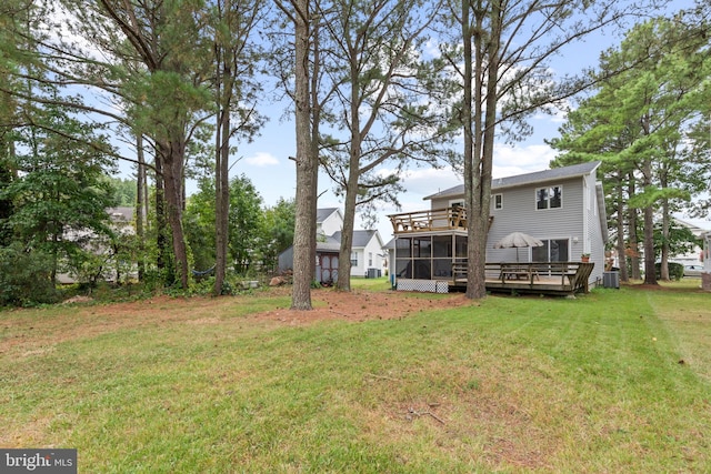 view of yard with cooling unit, a wooden deck, and a sunroom