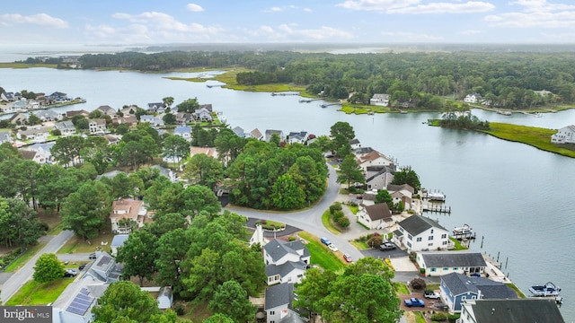 birds eye view of property featuring a residential view and a water view