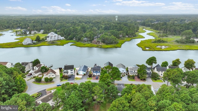 bird's eye view with a water view and a residential view