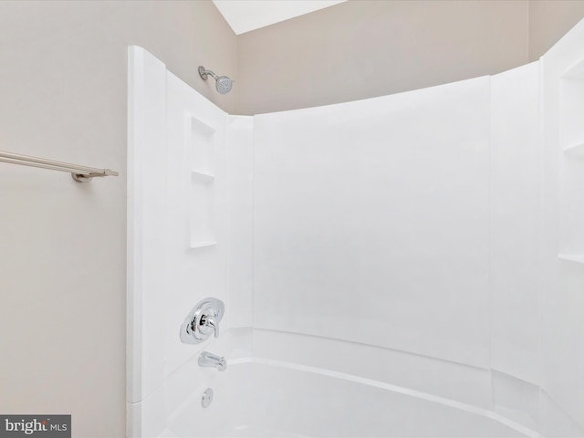 bathroom with shower / bathing tub combination