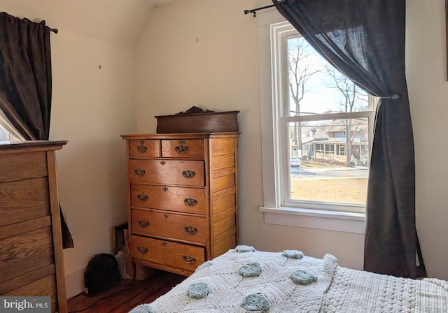 bedroom with wood finished floors