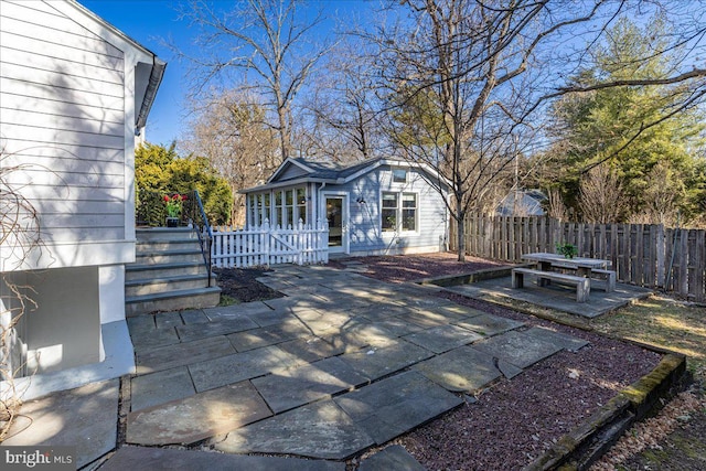 view of patio with fence