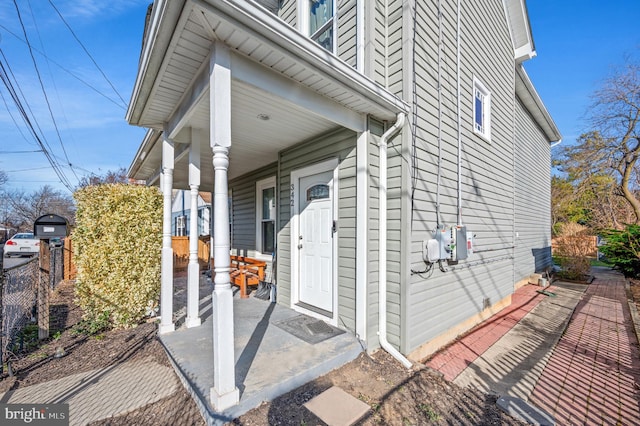 doorway to property with a porch