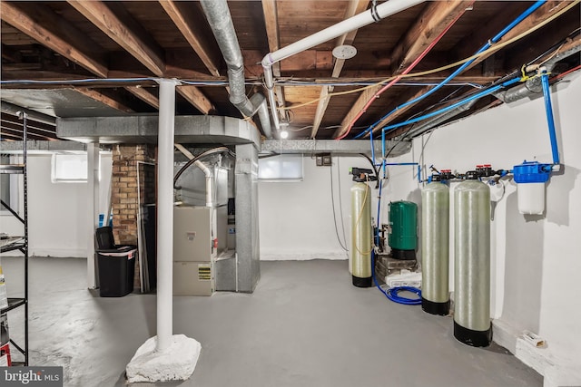 basement featuring heating unit