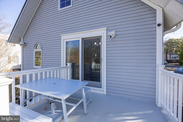 wooden terrace featuring outdoor dining space