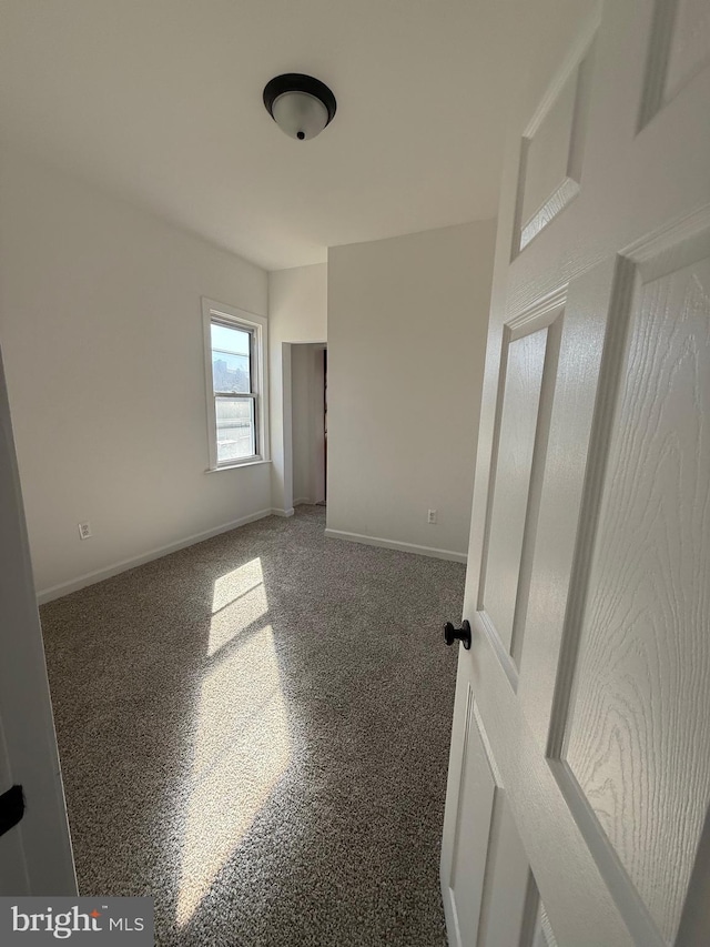 239 Midland, Brooklyn, MD 21225 - empty room featuring baseboards
