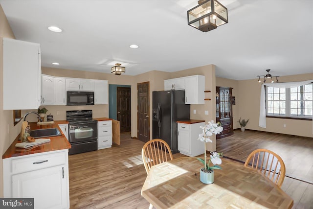 dining room featuring recessed lighting, baseboards, light wood-style floors, and ceiling fan