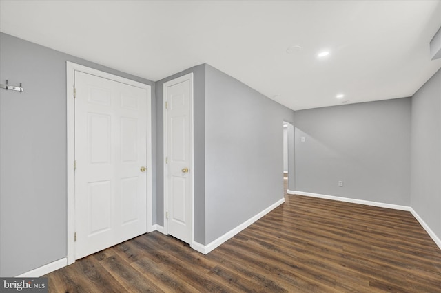 bonus room with recessed lighting, baseboards, and dark wood-style flooring