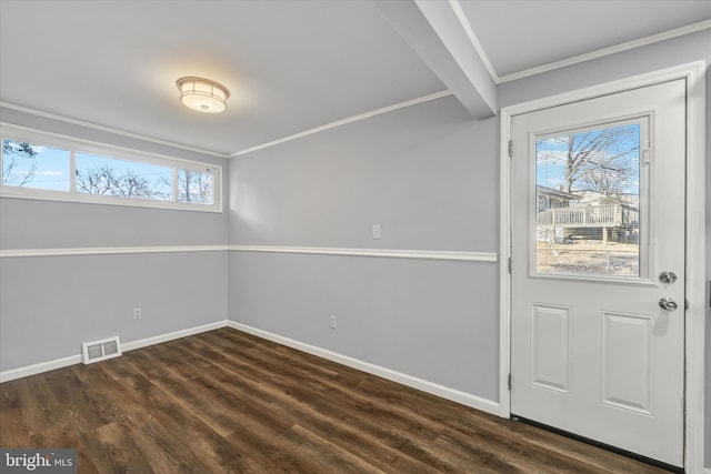 foyer with visible vents, baseboards, dark wood-style flooring, and crown molding