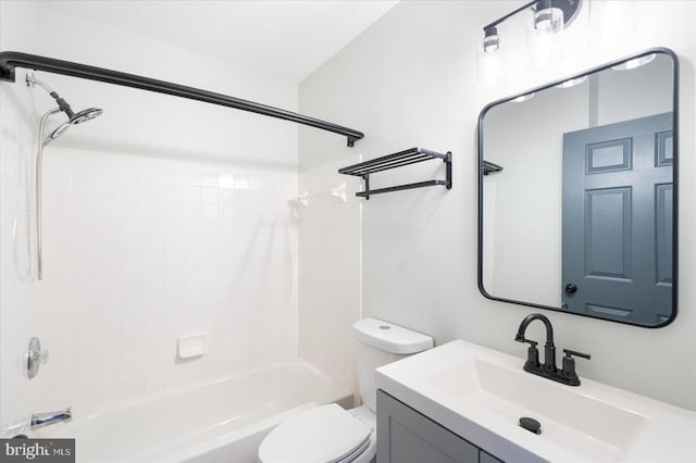 full bathroom featuring tub / shower combination, toilet, and vanity